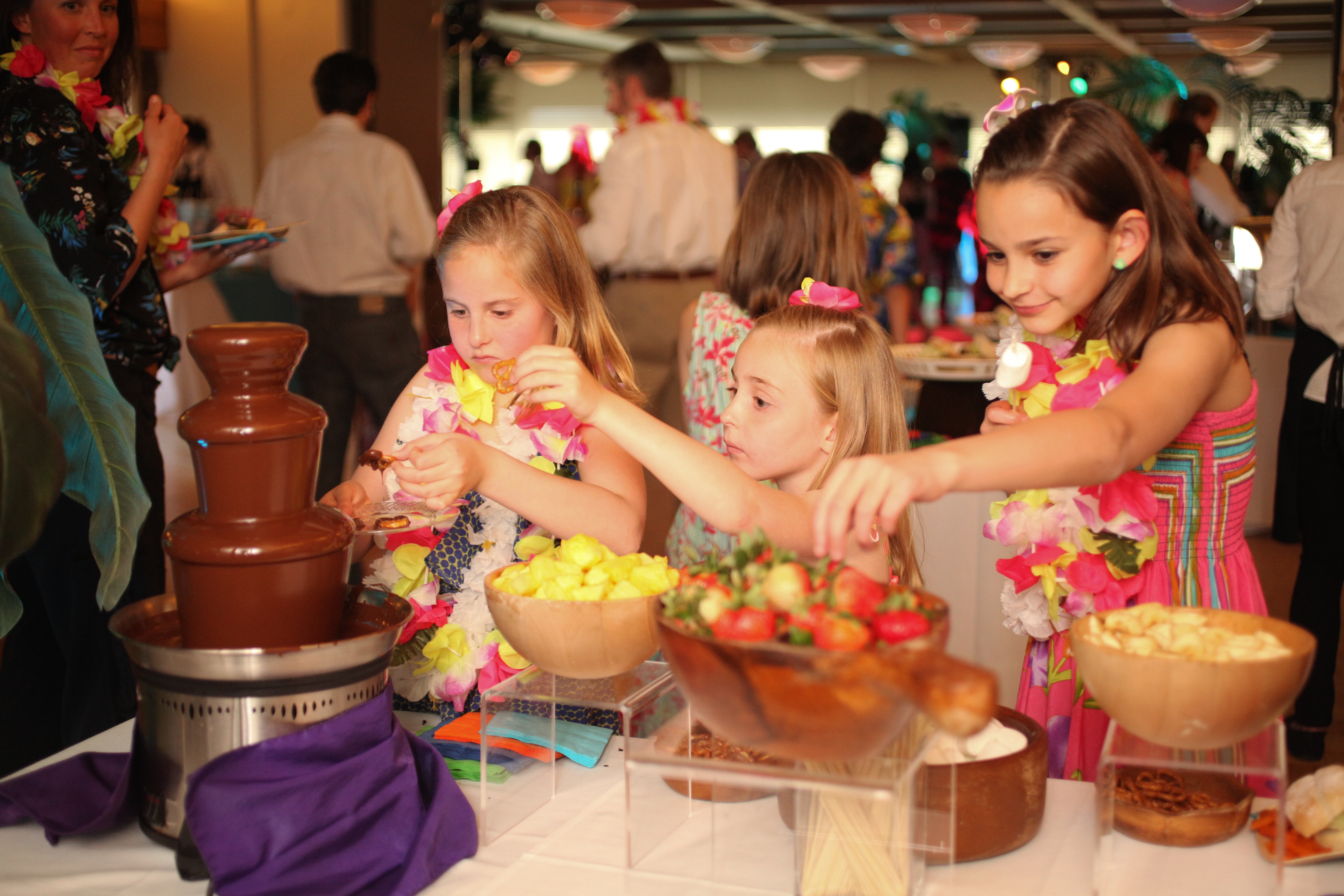 guests at catered event chocolate fountains