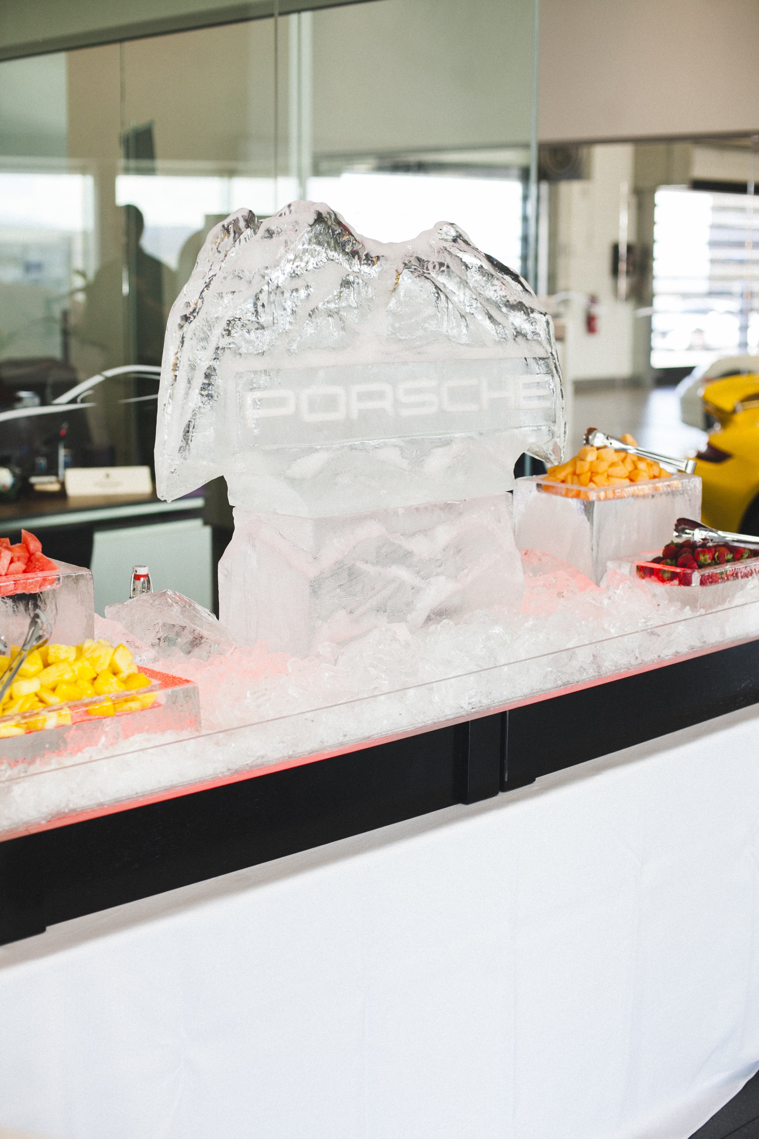 porche corporate event catering with ice sculpture