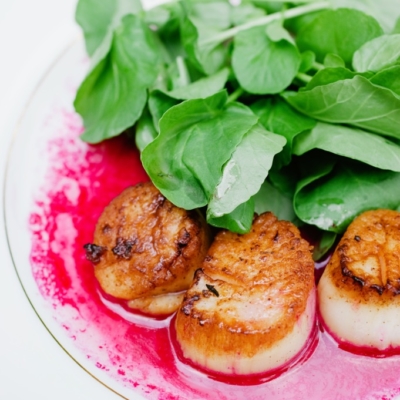 plated dinner scallops and spinach